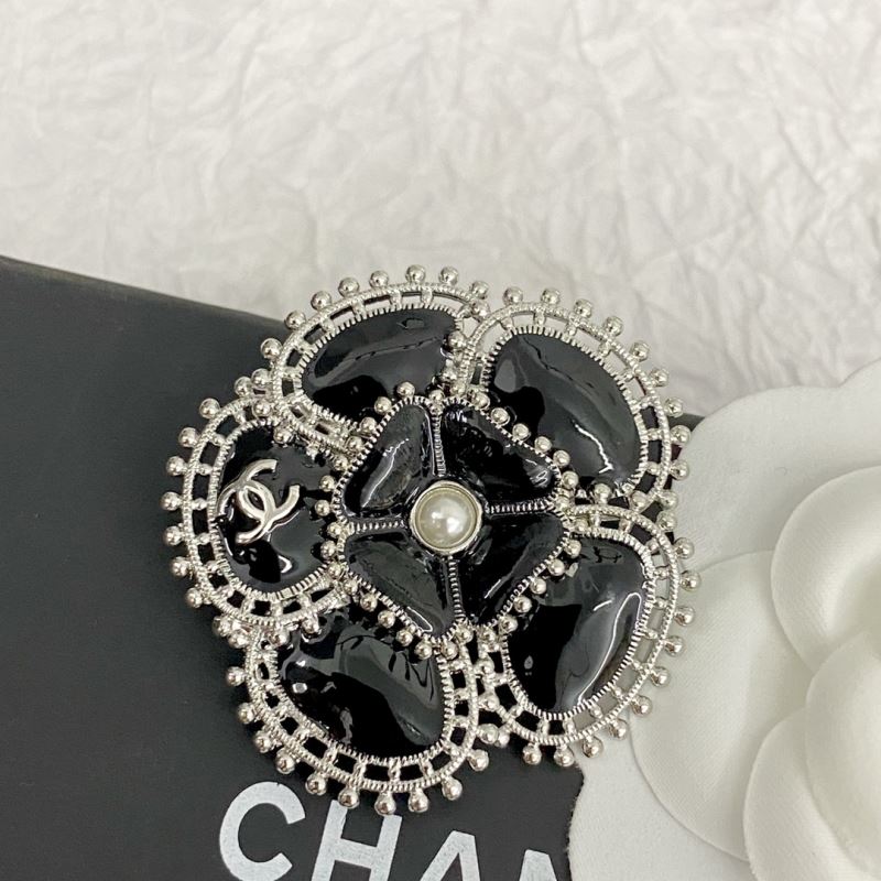 Ch**el brooches
